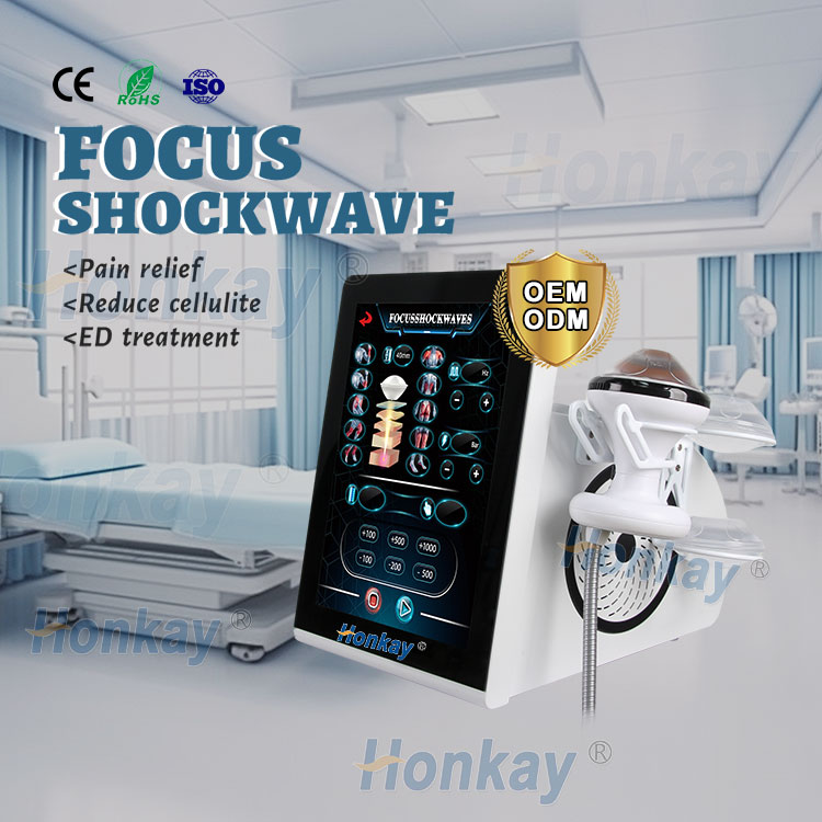 Focused shockwave unit in a treatment room shown with its touchscreen treatment interface, the handpiece, and the indications it is used for including pain relief and ED treatment, alongside OEM and ODM support