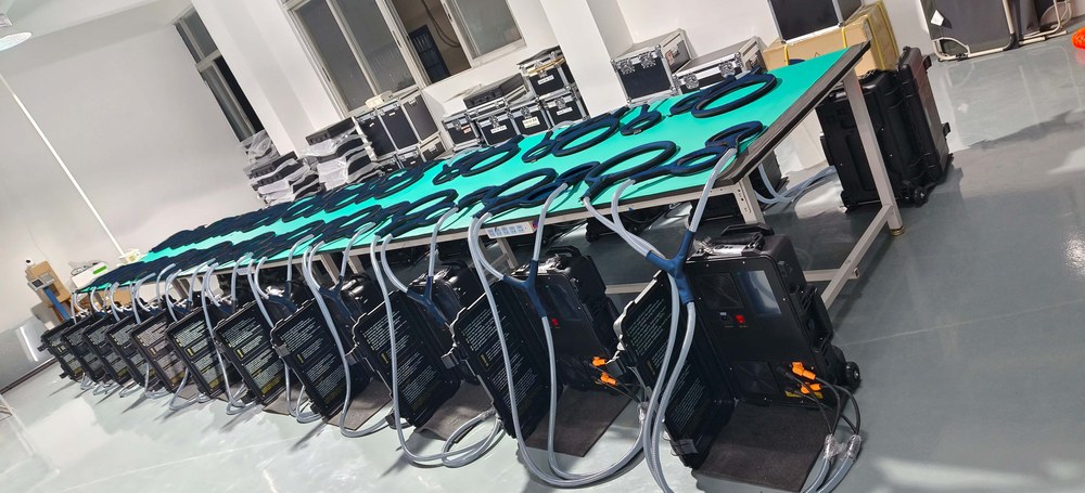 Row of PEMF units on the final test line at the Honkay factory before packing